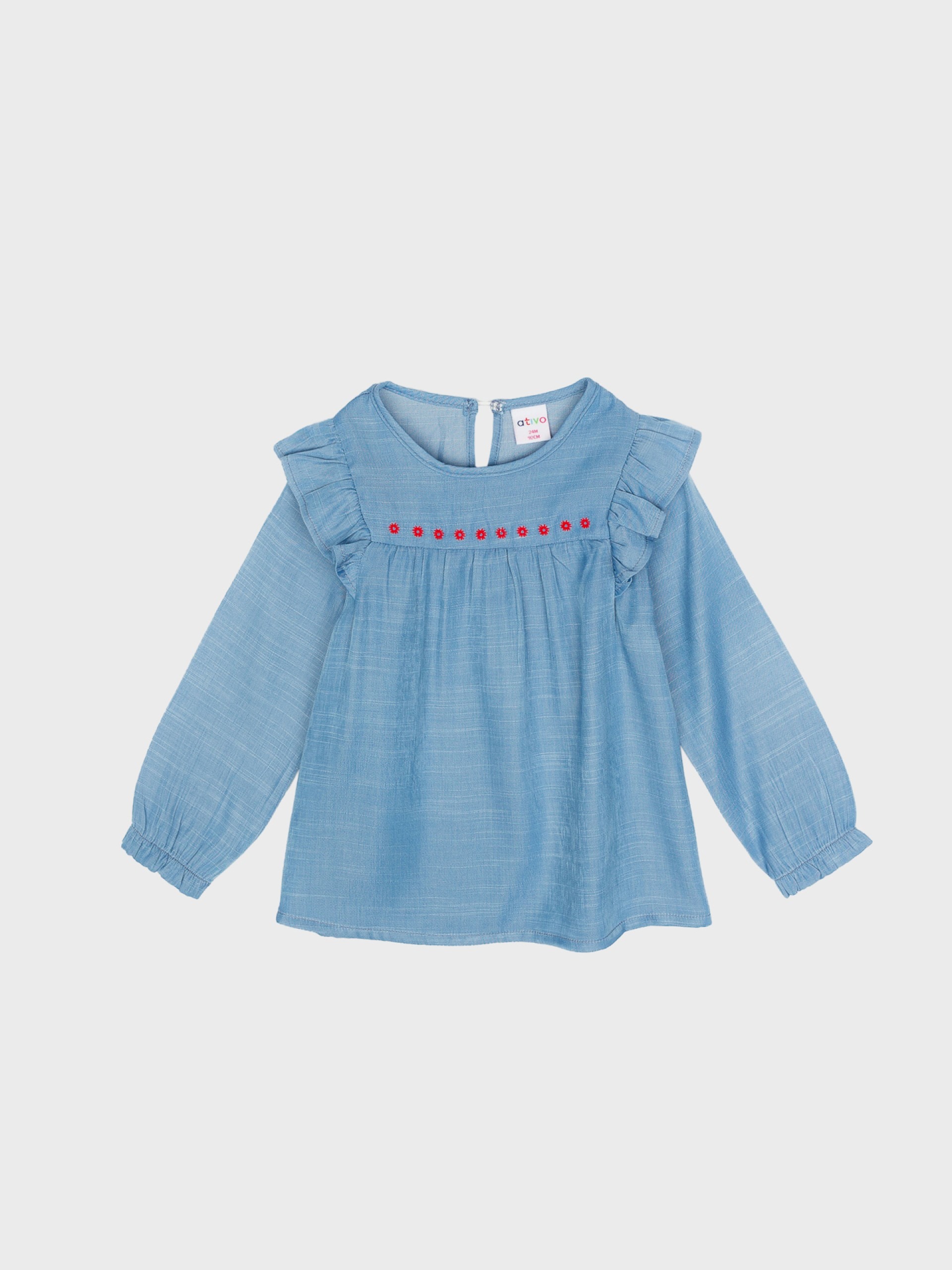 blouse couleur bleu jean, idéal cadeau naissance, pour bébé fille, petit haut mi saison, boutique de vêtements pour enfants à saint martin en haut