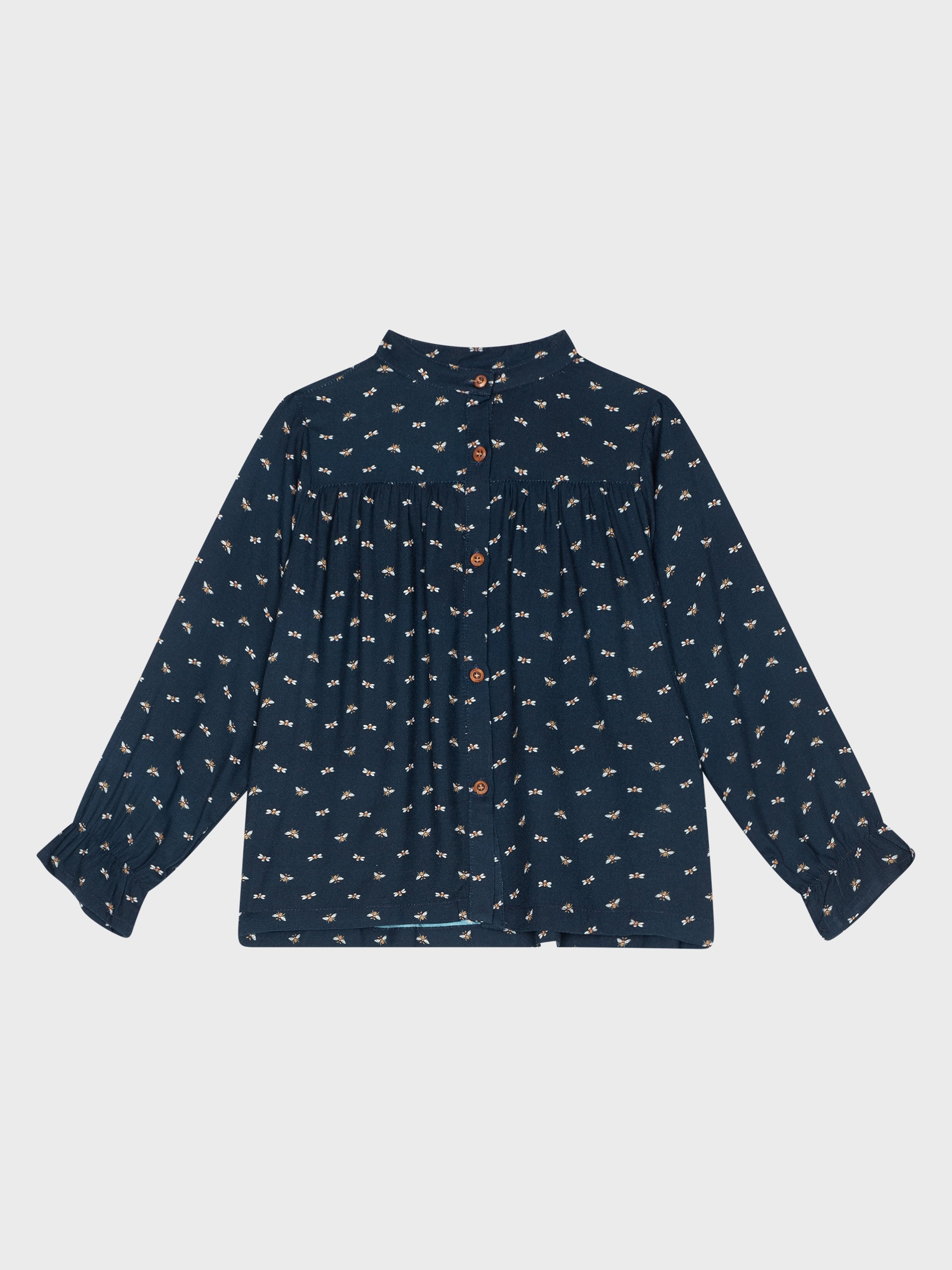 Chemisier marine avec motifs abeilles, pour filles et ados, boutique de vêtements pour enfants à Saint Martin en Haut, dans les Monts du Lyonnais.
