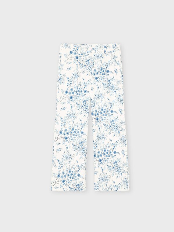 Pantalon blanc d'été, avec motifs fleurs, léger et agréable à porter pour filles et ados, boutique de vêtements à Saint Martin en Haut, dans les Monts du Lyonnais
