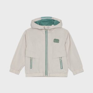 Blouson beige et vert