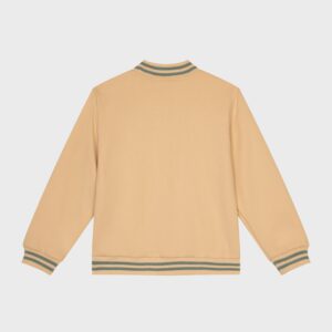 Veste beige liseré bleu