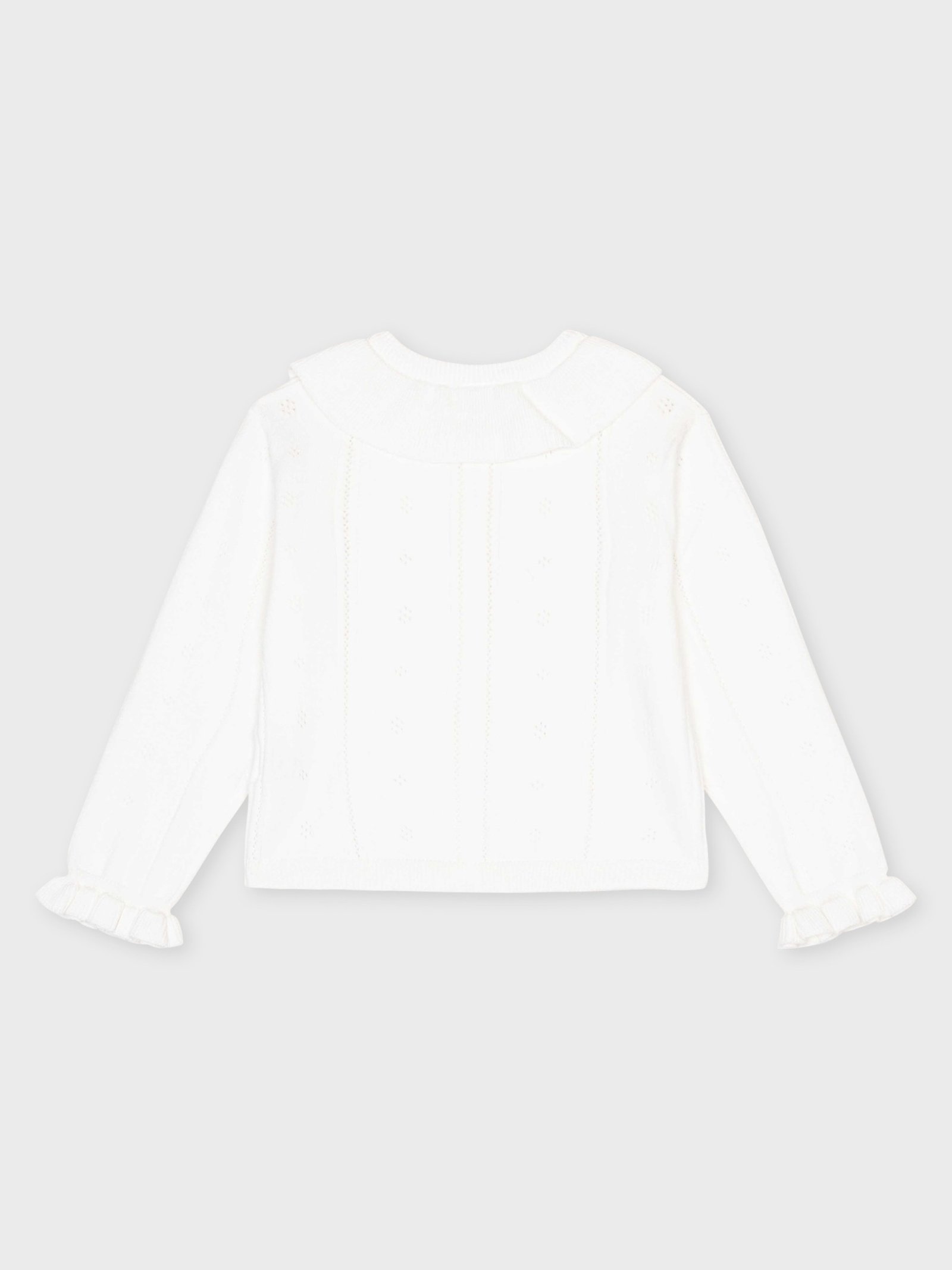 Veste blanche pour bébés filles, boutique de vêtements pour enfants à Saint Martin en Haut dans les Monts du Lyonnais.